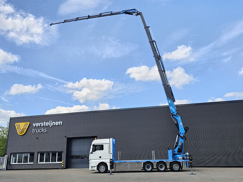 MAN TGX 35.480 8x4-4 / HMF 85 t/m + JIB / WINCH - Camión grúa: foto 2 MAN TGX 35.480 8x4-4 / HMF 85 t/m + JIB / WINCH - Camión grúa: foto 2