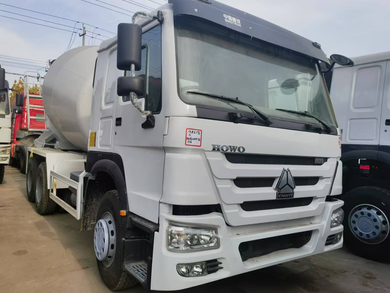 Sinotruk HOWO 371 Concrete mixer truck - Camión hormigonera: foto 1 Sinotruk HOWO 371 Concrete mixer truck - Camión hormigonera: foto 1
