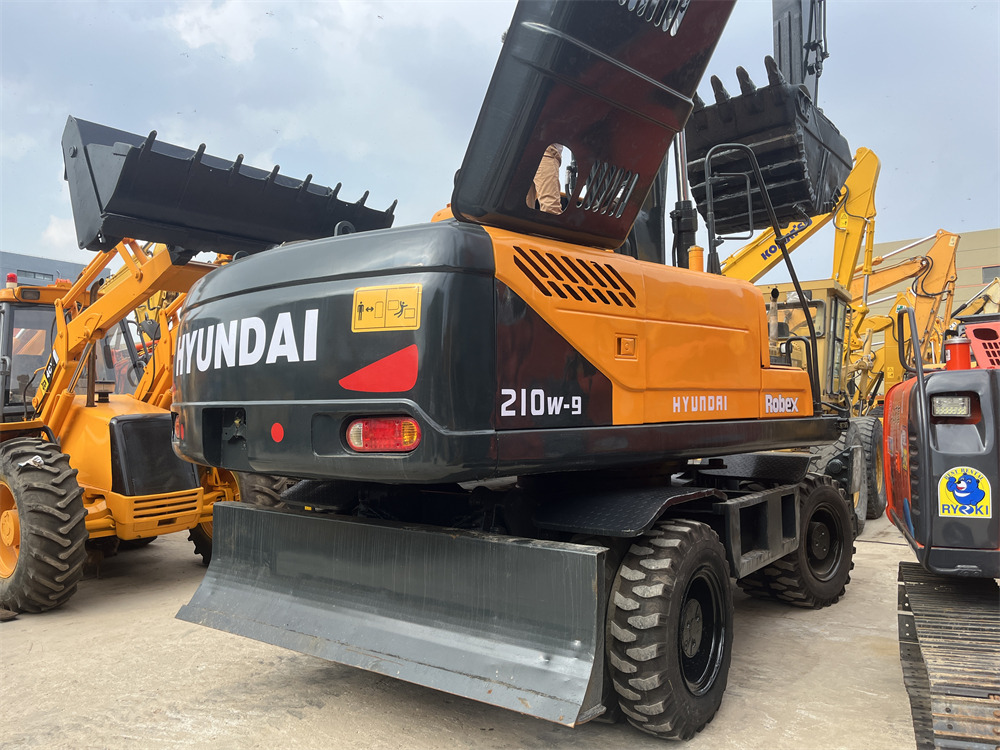 HYUNDAI 210W-9S 210W-9T 210W-9 - Excavadora de ruedas: foto 1 HYUNDAI 210W-9S 210W-9T 210W-9 - Excavadora de ruedas: foto 1