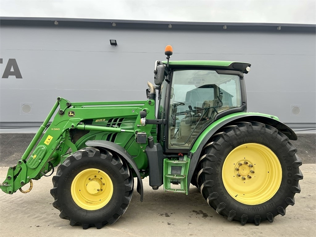 John Deere 6125 R AUTOPOWER ETUKUORMAAJALLA - Tractor: foto 1 John Deere 6125 R AUTOPOWER ETUKUORMAAJALLA - Tractor: foto 1