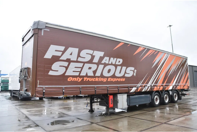 Fruehauf SLIDING CURTAINS/ROOF - TOPLIFT SYSTEM - LIFT AXLE - STEERING AXLE - SAF AXLES - ALCOA'S - DHOLLANDIA - TOP CONDITION - - Semirremolque lona: foto 5 Fruehauf SLIDING CURTAINS/ROOF - TOPLIFT SYSTEM - LIFT AXLE - STEERING AXLE - SAF AXLES - ALCOA'S - DHOLLANDIA - TOP CONDITION - - Semirremolque lona: foto 5