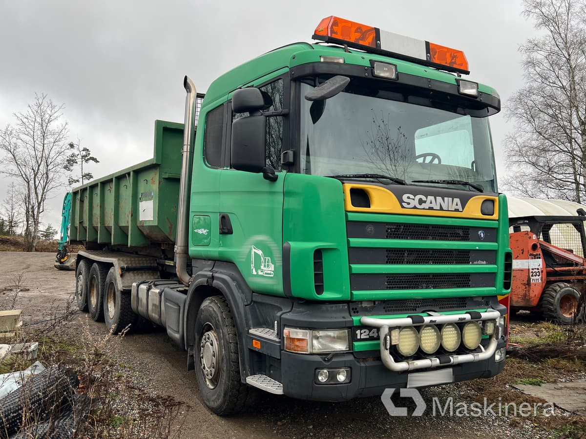 Lastväxlare Scania R124GB8X4 - Camión multibasculante: foto 1 Lastväxlare Scania R124GB8X4 - Camión multibasculante: foto 1