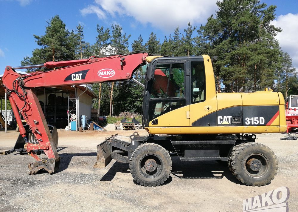 Caterpillar M315 C - Excavadora de ruedas: foto 2 Caterpillar M315 C - Excavadora de ruedas: foto 2