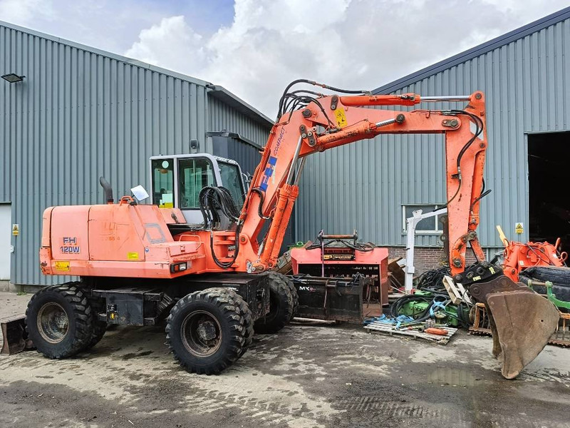 FIAT-HITACHI FH120W bandenkraan Wheel Excavator graafmachine - Excavadora de ruedas: foto 1 FIAT-HITACHI FH120W bandenkraan Wheel Excavator graafmachine - Excavadora de ruedas: foto 1