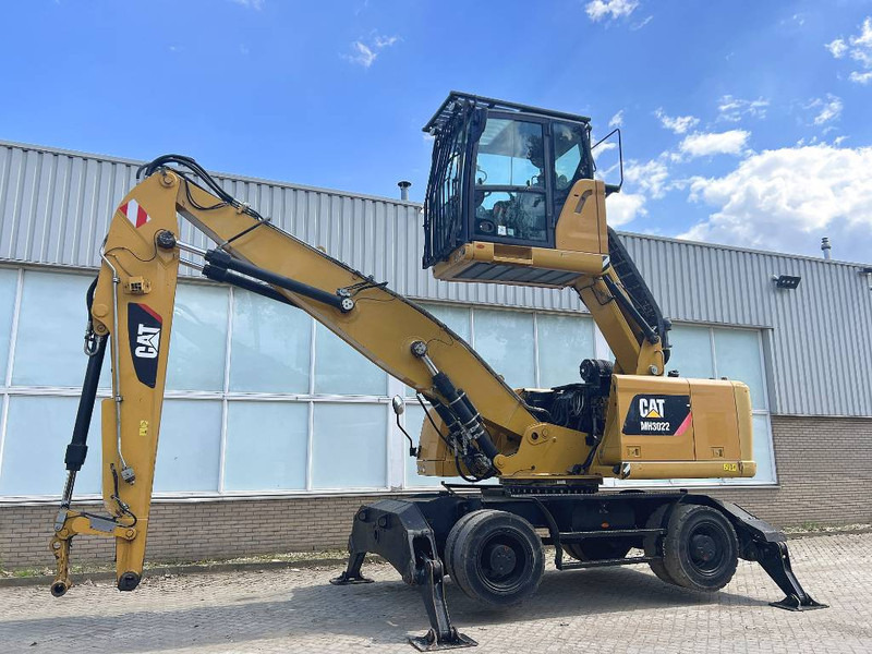 Manipulador de materiales para transporte de basura Cat MH 3022    2015    CE: foto 8