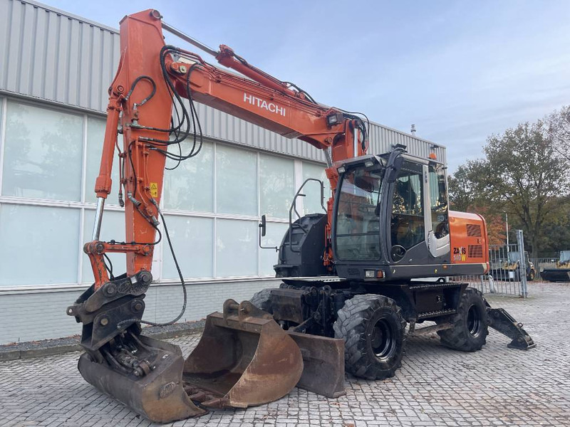 Hitachi ZX 140 W-3 - Excavadora de ruedas: foto 1 Hitachi ZX 140 W-3 - Excavadora de ruedas: foto 1