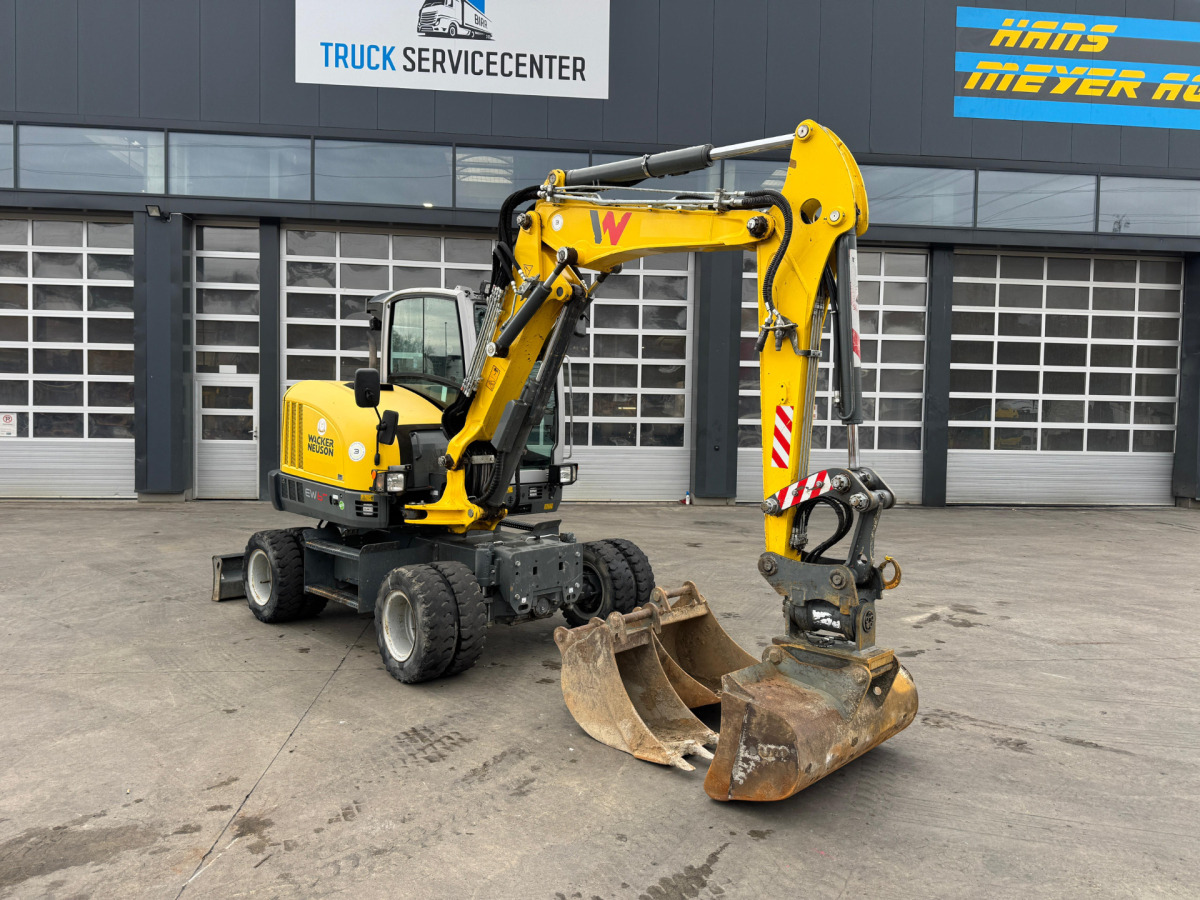 NEUSON EW65 E14-2 Powertilt 3x Schaufeln - Excavadora de ruedas: foto 2 NEUSON EW65 E14-2 Powertilt 3x Schaufeln - Excavadora de ruedas: foto 2