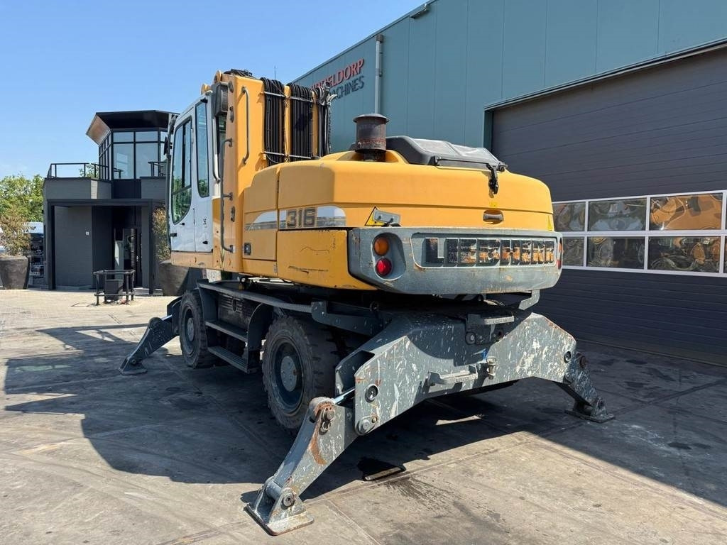Manipulador de materiales Liebherr A 316: foto 10