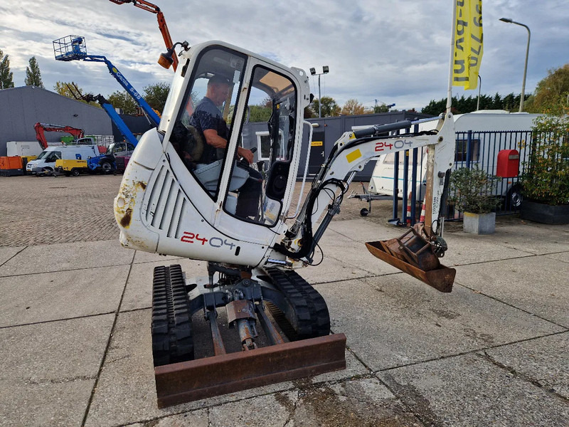 WACKER NEUSON 2404RD, kan op een berghelling draaien - Miniexcavadora: foto 1 WACKER NEUSON 2404RD, kan op een berghelling draaien - Miniexcavadora: foto 1