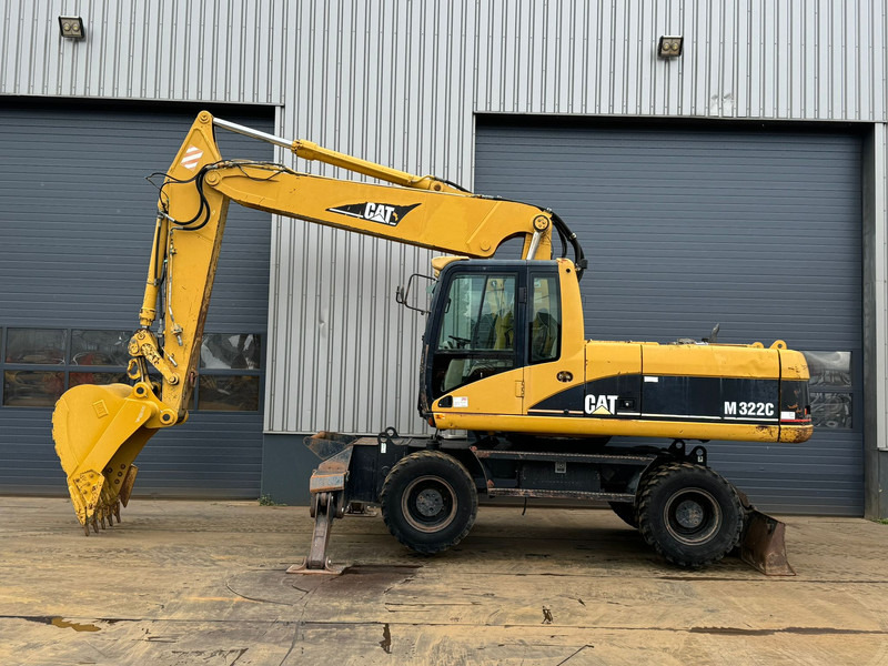 Caterpillar M322C - Hydraulic stabilizers / VA Triple boom / CE-certified, - Excavadora de ruedas: foto 1 Caterpillar M322C - Hydraulic stabilizers / VA Triple boom / CE-certified, - Excavadora de ruedas: foto 1