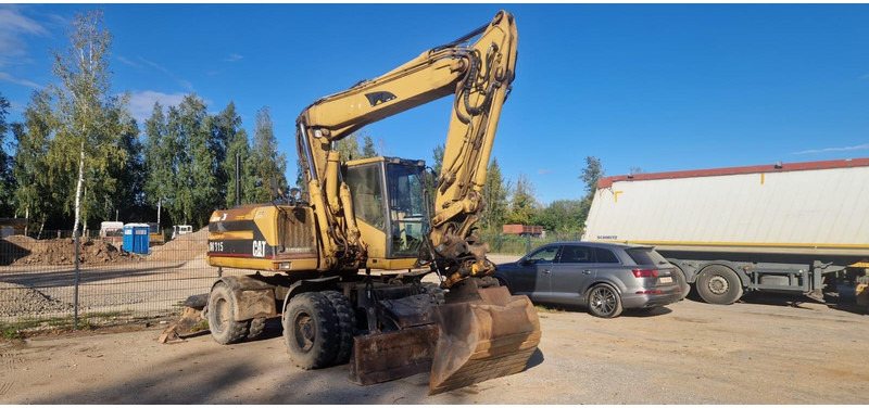 Caterpillar M 315 Rototilt - Excavadora de ruedas: foto 1 Caterpillar M 315 Rototilt - Excavadora de ruedas: foto 1