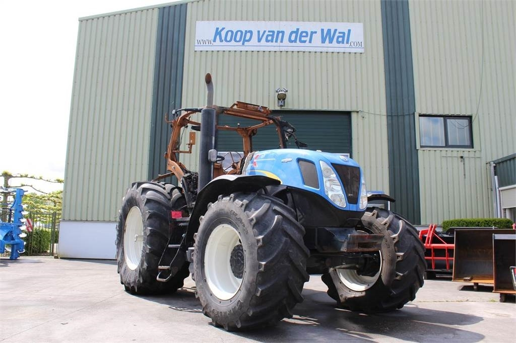 New Holland T7030 - Tractor: foto 1 New Holland T7030 - Tractor: foto 1