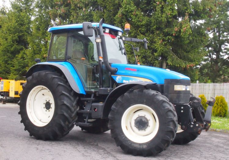 Ciągnik New Holland TM 140 2004 Przedni TUZ - Tractor: foto 1 Ciągnik New Holland TM 140 2004 Przedni TUZ - Tractor: foto 1