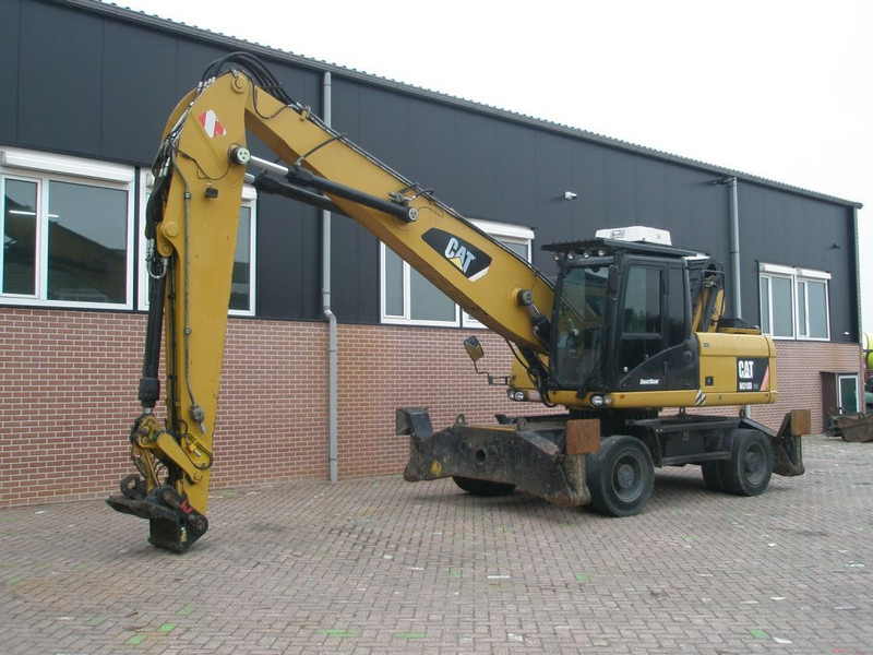 Caterpillar M318D - Excavadora de ruedas: foto 1 Caterpillar M318D - Excavadora de ruedas: foto 1