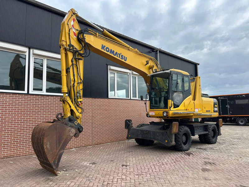 Komatsu PW200 - Excavadora de ruedas: foto 1 Komatsu PW200 - Excavadora de ruedas: foto 1