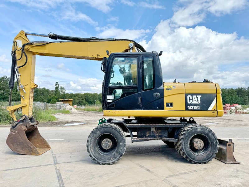 Cat M315D - Triple Boom / Quick Coupler - Excavadora de ruedas: foto 1 Cat M315D - Triple Boom / Quick Coupler - Excavadora de ruedas: foto 1