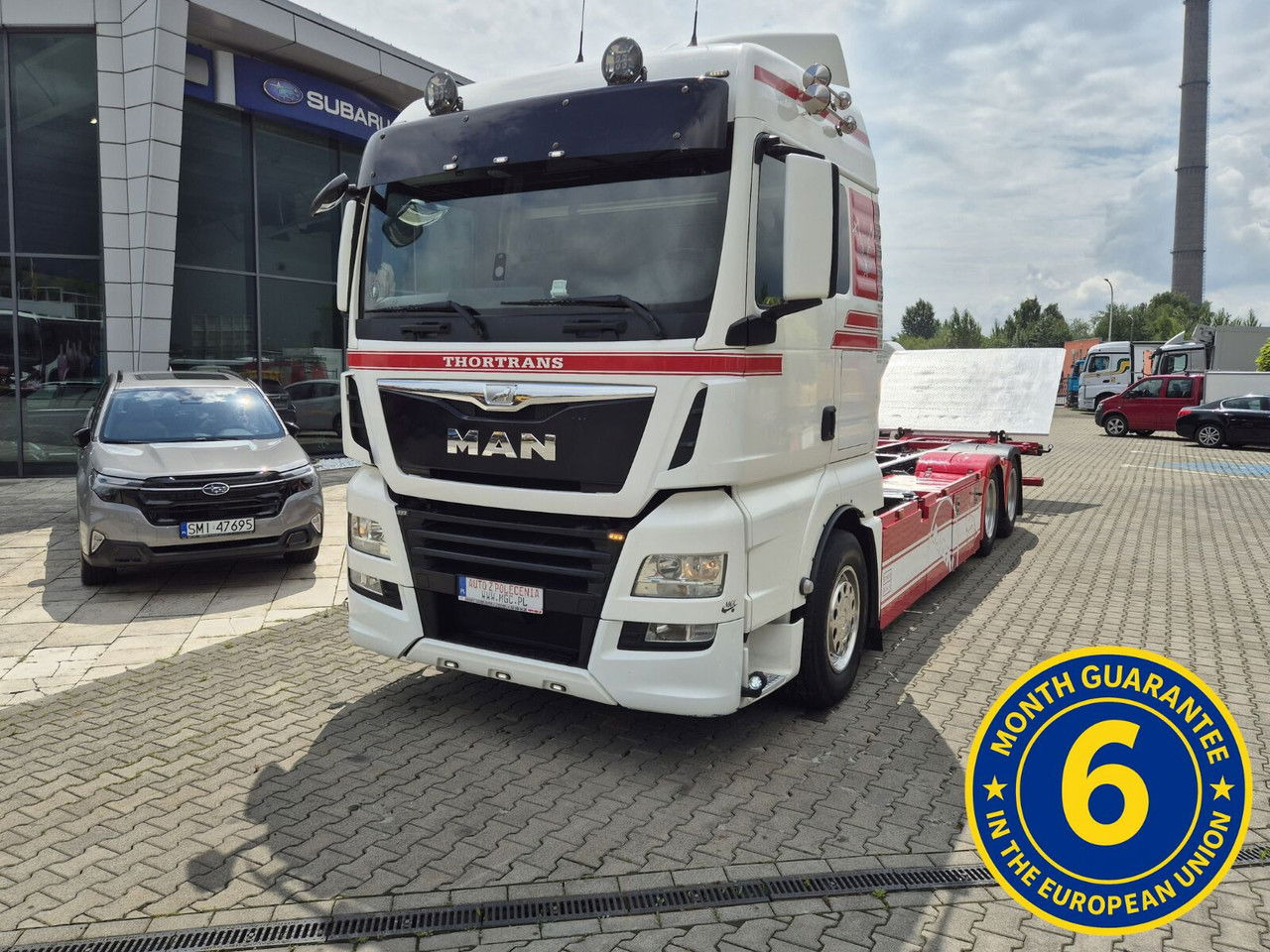 MAN TGX 28 28.420 , 6x2-2 LL + Trailer HFR KM 20 - Camión portacontenedore/ Intercambiable: foto 2 MAN TGX 28 28.420 , 6x2-2 LL + Trailer HFR KM 20 - Camión portacontenedore/ Intercambiable: foto 2