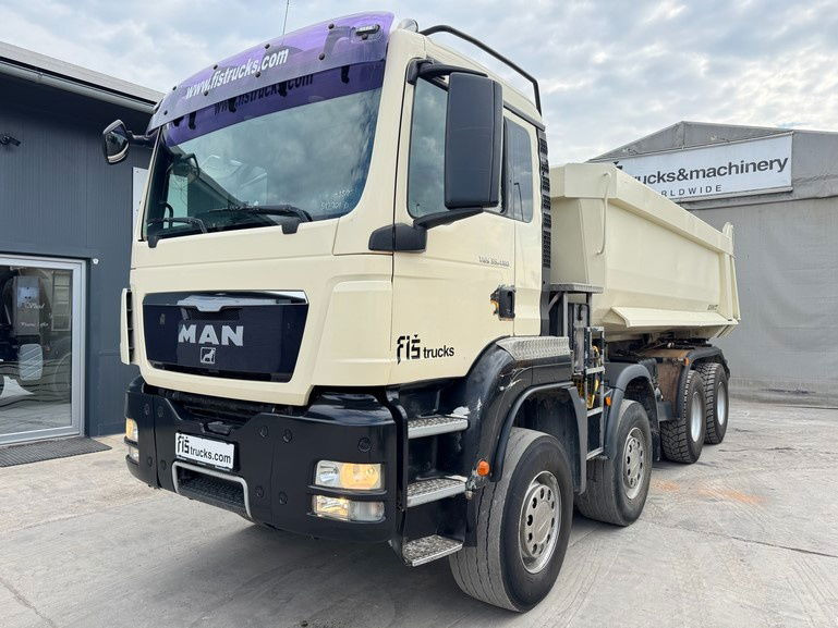 MAN TGS 35.480 8x4 schmitz dumper tipper - Camión volquete: foto 1 MAN TGS 35.480 8x4 schmitz dumper tipper - Camión volquete: foto 1