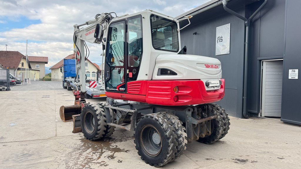 Takeuchi TB295W - 2014 Year - Powertilt - 3X Buckets - Excavadora de ruedas: foto 3 Takeuchi TB295W - 2014 Year - Powertilt - 3X Buckets - Excavadora de ruedas: foto 3