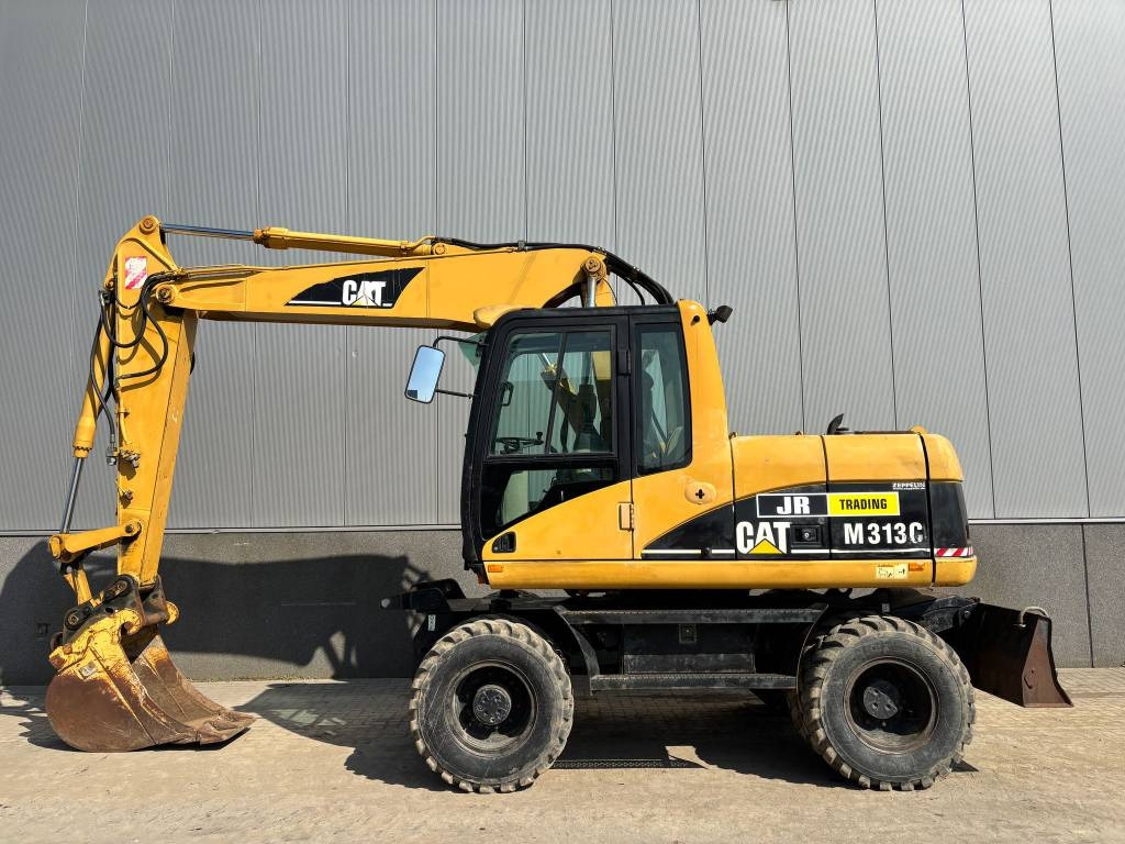 CAT M 313 C (Low verified hours)  - Excavadora de ruedas: foto 1 CAT M 313 C (Low verified hours)  - Excavadora de ruedas: foto 1