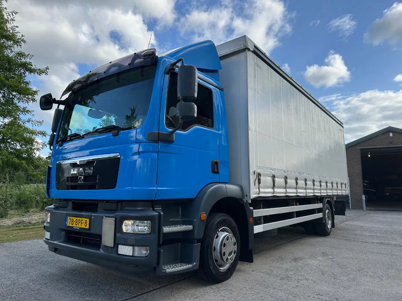 MAN TGM 15.250 / NL TRUCK / EURO 5 / SLIDING ROOF / BOX + TAILLIFT / FULL AIR / NAVI - Camión caja cerrada: foto 1 MAN TGM 15.250 / NL TRUCK / EURO 5 / SLIDING ROOF / BOX + TAILLIFT / FULL AIR / NAVI - Camión caja cerrada: foto 1