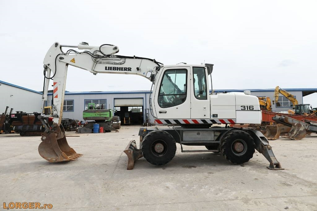 Liebherr A 316 Litronic - Excavadora de ruedas: foto 4 Liebherr A 316 Litronic - Excavadora de ruedas: foto 4