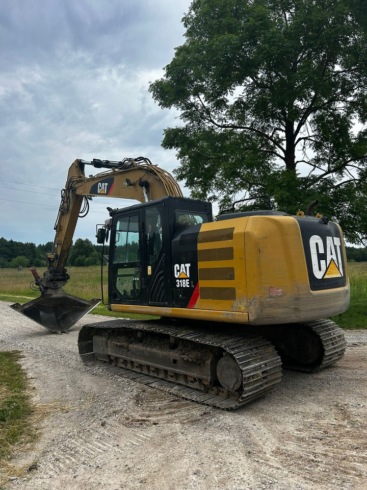 CATERPILLAR 318 E - Excavadora de cadenas: foto 1 CATERPILLAR 318 E - Excavadora de cadenas: foto 1