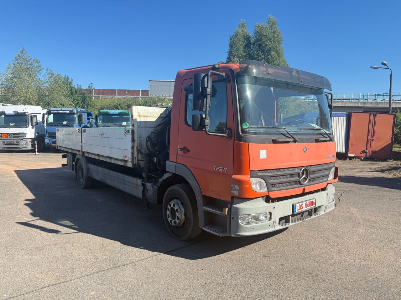 Mercedes-Benz Atego 1223 mit Kran MKG HLK 76 - Camión caja abierta, Camión grúa: foto 2 Mercedes-Benz Atego 1223 mit Kran MKG HLK 76 - Camión caja abierta, Camión grúa: foto 2