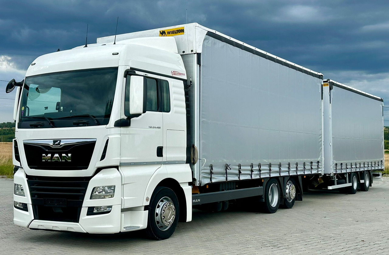 MAN TGX 26.460 / ZESTAW PRZEJAZDOWY / 38 PALET / AUTOMAT / SYPIALKA / PRZYCZEPA WIELTON / 2019 ROK / NISKI PRZEBIEG - Camión lona: foto 1 MAN TGX 26.460 / ZESTAW PRZEJAZDOWY / 38 PALET / AUTOMAT / SYPIALKA / PRZYCZEPA WIELTON / 2019 ROK / NISKI PRZEBIEG - Camión lona: foto 1