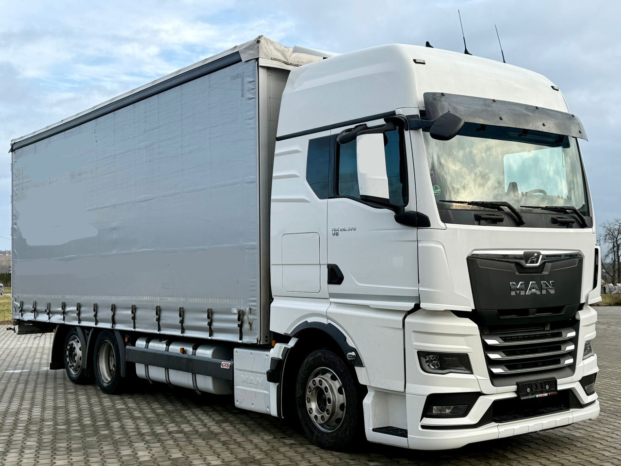 MAN TGX 26.470 / FIRANKA / 19 EUROPALET / XXL / NISKI PRZEBIEG / NOWY MODEL / 6X2 - Camión lona: foto 1 MAN TGX 26.470 / FIRANKA / 19 EUROPALET / XXL / NISKI PRZEBIEG / NOWY MODEL / 6X2 - Camión lona: foto 1