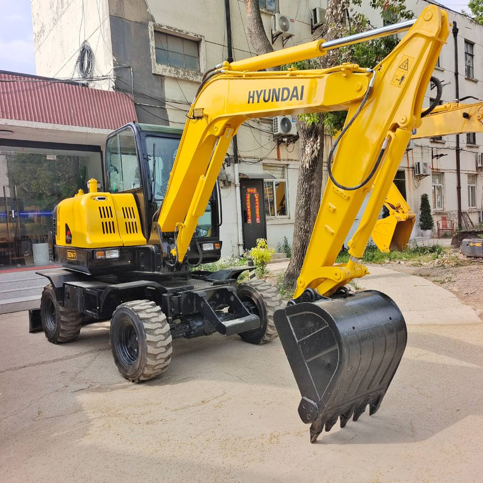 Hyundai 60 W-7 60W-9 - Excavadora de ruedas: foto 2 Hyundai 60 W-7 60W-9 - Excavadora de ruedas: foto 2
