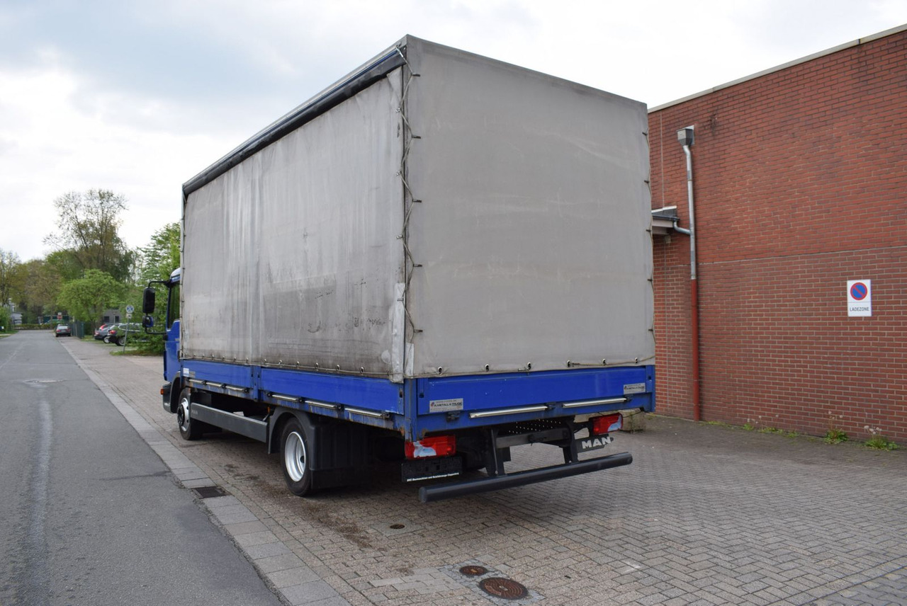 MAN TGL 8.180 Pritsche Schiebeplane Klima 3-Sitzer - Furgoneta con lona: foto 5 MAN TGL 8.180 Pritsche Schiebeplane Klima 3-Sitzer - Furgoneta con lona: foto 5