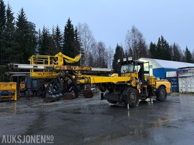 2012 Atlas Copco Boomer E2C Borerigg, To-bom oppsett med integrert kurv - Perforadora: foto 1 2012 Atlas Copco Boomer E2C Borerigg, To-bom oppsett med integrert kurv - Perforadora: foto 1