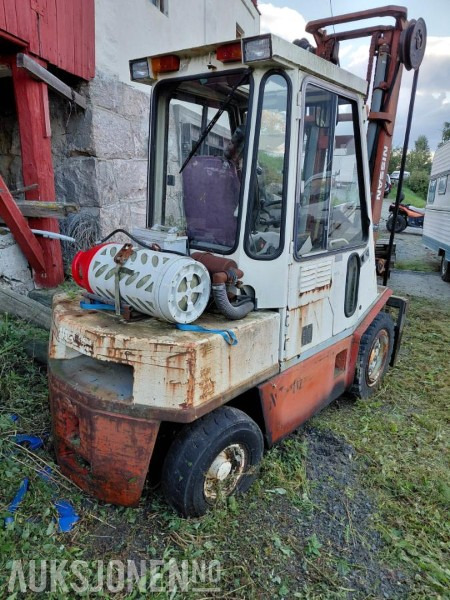 1993 Nissan RGH02A30U gaffeltruck - Equipo de manutención: foto 2 1993 Nissan RGH02A30U gaffeltruck - Equipo de manutención: foto 2