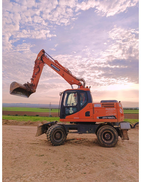Doosan DX140W-3 *coming soon* - Excavadora de ruedas: foto 1 Doosan DX140W-3 *coming soon* - Excavadora de ruedas: foto 1