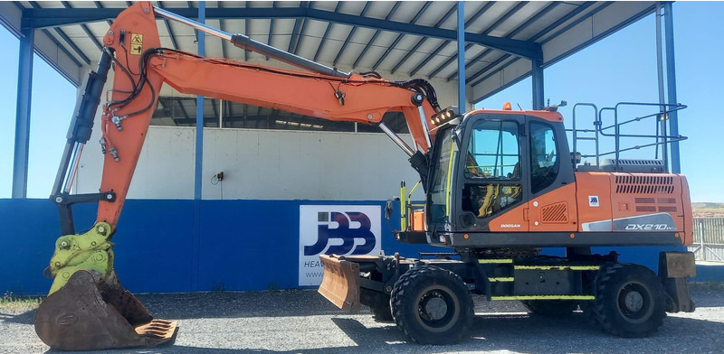 Doosan DX210W-5 - Excavadora de ruedas: foto 1 Doosan DX210W-5 - Excavadora de ruedas: foto 1