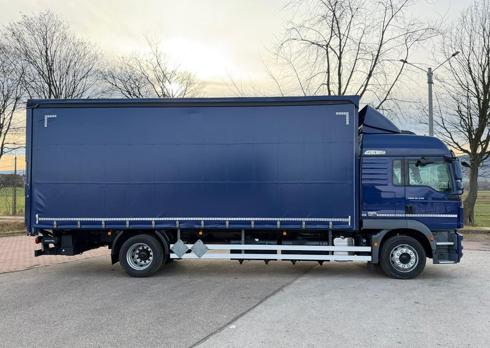 Camión lona MAN TGM 18.340 / FIRANKA / SPROWADZONY / 9100 ŁADOWNOŚĆ / 18 PALET / E6 / WINDA /: foto 10 Camión lona MAN TGM 18.340 / FIRANKA / SPROWADZONY / 9100 ŁADOWNOŚĆ / 18 PALET / E6 / WINDA /: foto 10