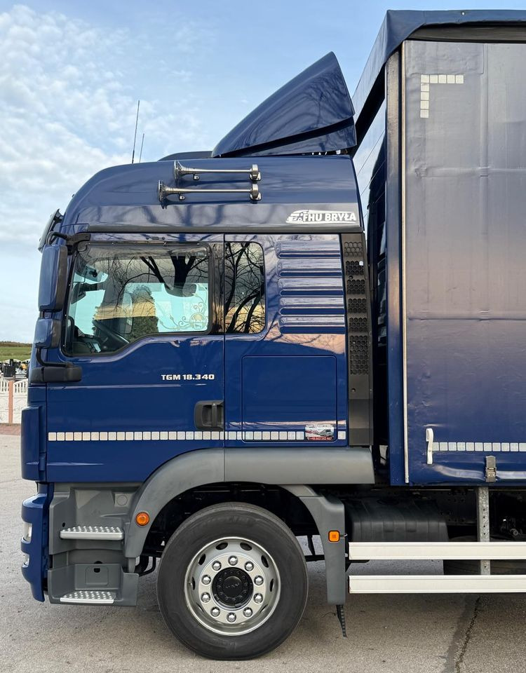 Camión lona MAN TGM 18.340 / FIRANKA / SPROWADZONY / 9100 ŁADOWNOŚĆ / 18 PALET / E6 / WINDA /: foto 8 Camión lona MAN TGM 18.340 / FIRANKA / SPROWADZONY / 9100 ŁADOWNOŚĆ / 18 PALET / E6 / WINDA /: foto 8