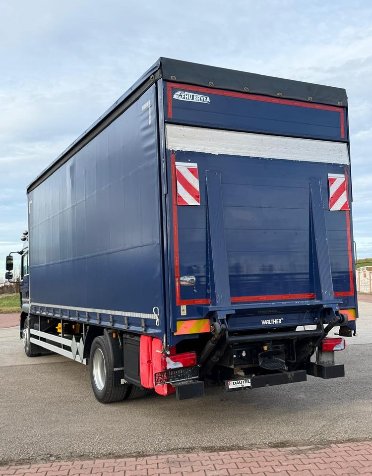 Camión lona MAN TGM 18.340 / FIRANKA / SPROWADZONY / 9100 ŁADOWNOŚĆ / 18 PALET / E6 / WINDA /: foto 14 Camión lona MAN TGM 18.340 / FIRANKA / SPROWADZONY / 9100 ŁADOWNOŚĆ / 18 PALET / E6 / WINDA /: foto 14