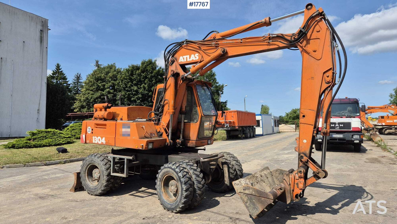 ATLAS 1304 wheeled excavator (1993) - Excavadora de ruedas: foto 1 ATLAS 1304 wheeled excavator (1993) - Excavadora de ruedas: foto 1