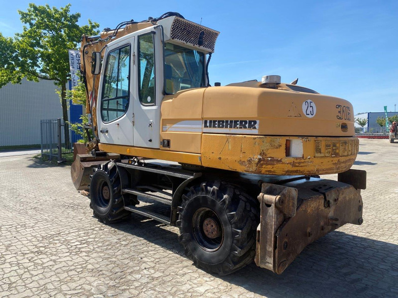 Liebherr A316 Litronic NVT - Excavadora de ruedas: foto 1 Liebherr A316 Litronic NVT - Excavadora de ruedas: foto 1