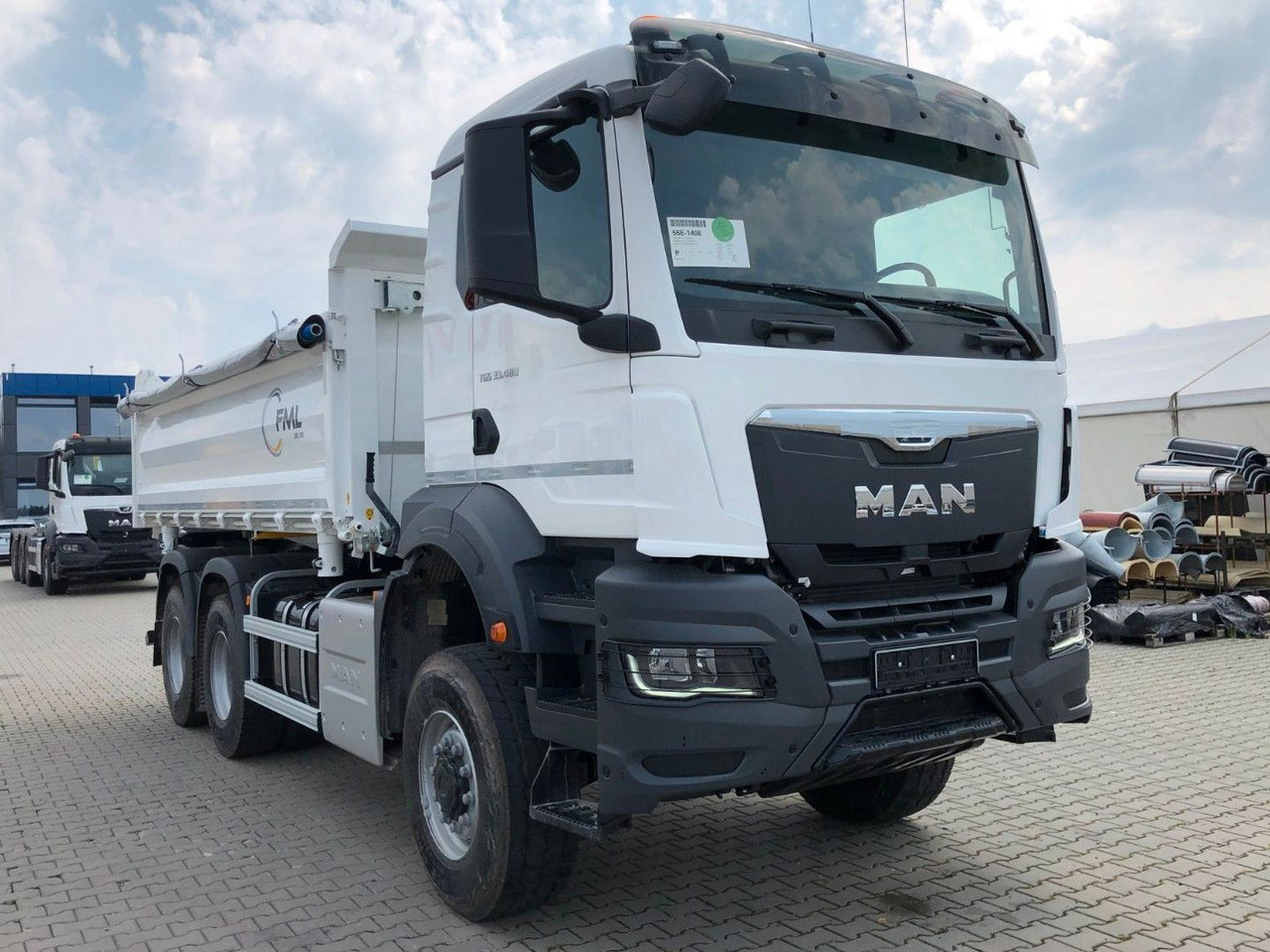 MAN TGS 33.480 6X6 FML Dreiseitenkipper - Camión volquete: foto 1 MAN TGS 33.480 6X6 FML Dreiseitenkipper - Camión volquete: foto 1