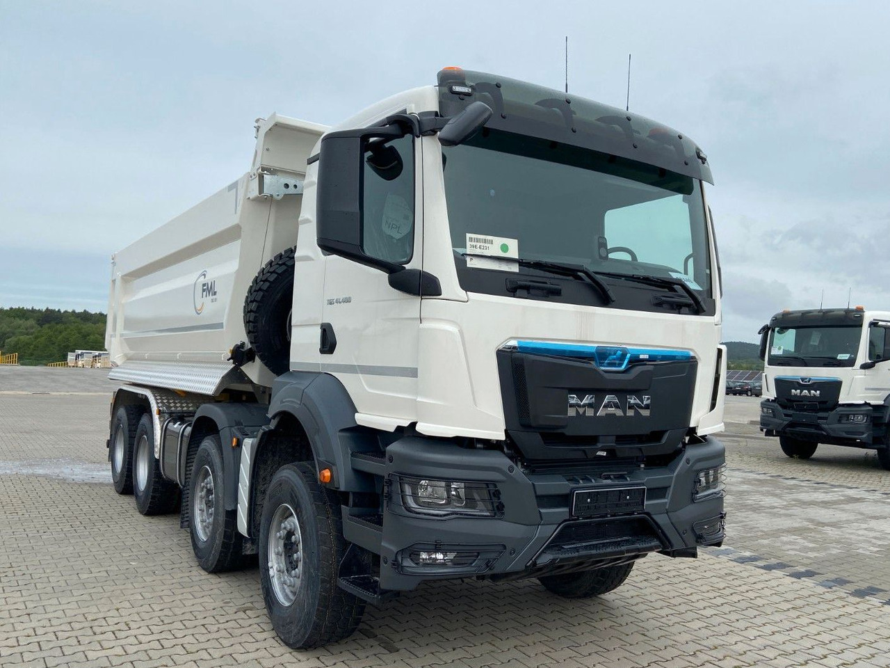 MAN TGS 41.400 8x4 EURO2 FML KIPPER 21M3 - Camión volquete: foto 1 MAN TGS 41.400 8x4 EURO2 FML KIPPER 21M3 - Camión volquete: foto 1