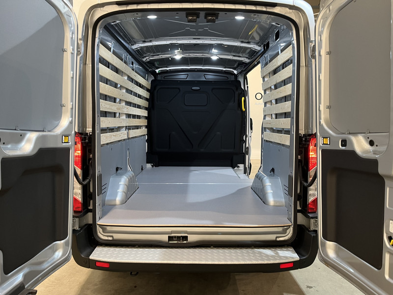 Ford E-Transit 350 L2H2 Trend 68 kWh 184 PK / 100% elektrisch !! / Airco / Cruise Control / CarPlay / Camera / Navigatie / 3-Zits / 900 KM !! Z.G.A.N. ! - Furgón, Furgoneta eléctrica: foto 5 Ford E-Transit 350 L2H2 Trend 68 kWh 184 PK / 100% elektrisch !! / Airco / Cruise Control / CarPlay / Camera / Navigatie / 3-Zits / 900 KM !! Z.G.A.N. ! - Furgón, Furgoneta eléctrica: foto 5