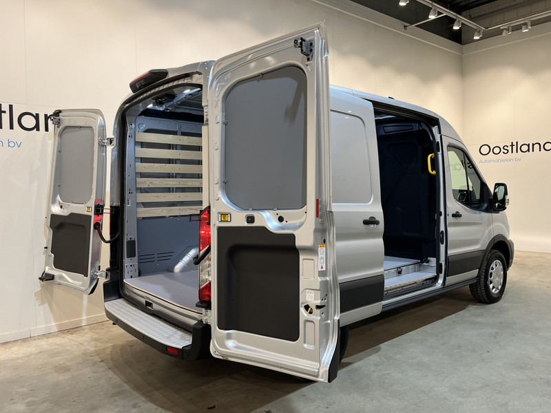 Ford E-Transit 350 L2H2 Trend 68 kWh 184 PK / 100% elektrisch !! / Airco / Cruise Control / CarPlay / Camera / Navigatie / 3-Zits / 900 KM !! Z.G.A.N. ! - Furgón, Furgoneta eléctrica: foto 4 Ford E-Transit 350 L2H2 Trend 68 kWh 184 PK / 100% elektrisch !! / Airco / Cruise Control / CarPlay / Camera / Navigatie / 3-Zits / 900 KM !! Z.G.A.N. ! - Furgón, Furgoneta eléctrica: foto 4