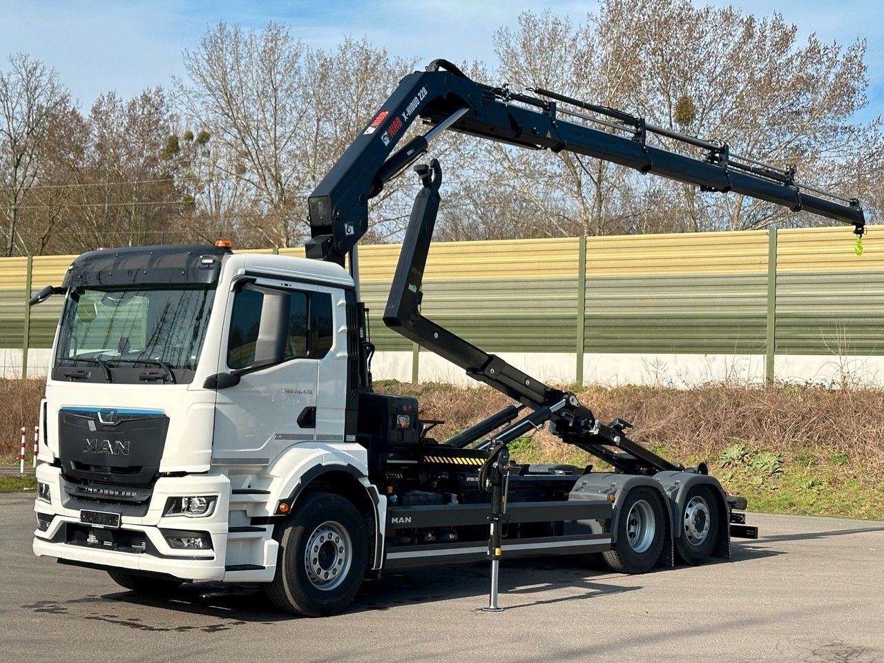 MAN TGS 26.470 6x2 Abrollkipper + Kran Hiab 228-4 - Camión multibasculante, Camión grúa: foto 1 MAN TGS 26.470 6x2 Abrollkipper + Kran Hiab 228-4 - Camión multibasculante, Camión grúa: foto 1