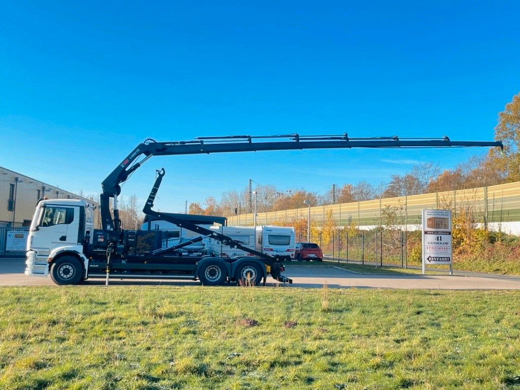 MAN TGS 26.470 6x2 Abrollkipper + Kran Hiab 228-6 - Camión multibasculante, Camión grúa: foto 3 MAN TGS 26.470 6x2 Abrollkipper + Kran Hiab 228-6 - Camión multibasculante, Camión grúa: foto 3