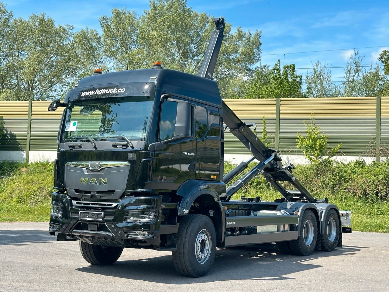 MAN TGS 33.520 6X4 Euro6e Abrollkipper MULTILIFT - Camión multibasculante, Camión grúa: foto 2 MAN TGS 33.520 6X4 Euro6e Abrollkipper MULTILIFT - Camión multibasculante, Camión grúa: foto 2