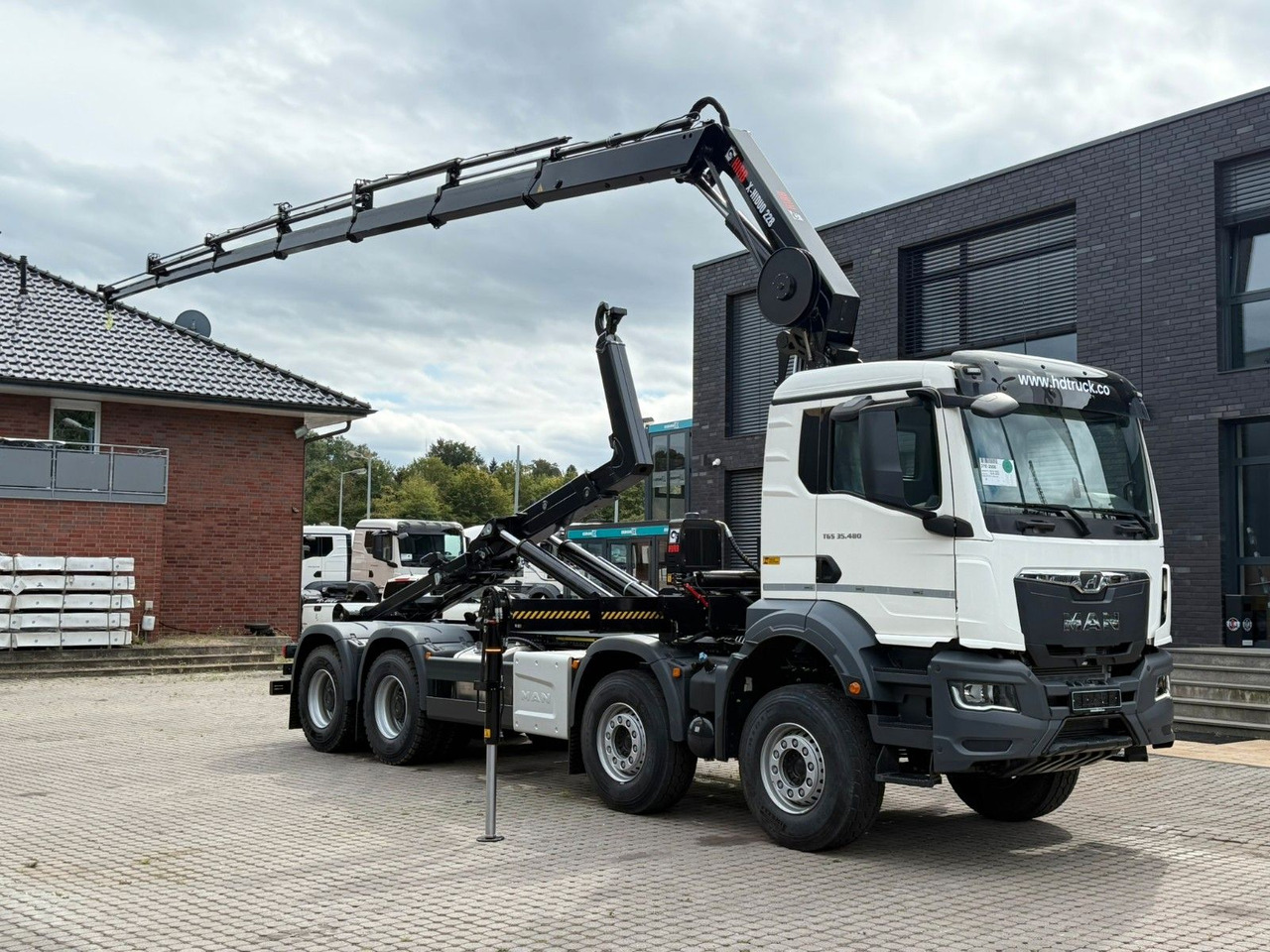 MAN TGS 35.480 8x4 Abrollkipper + Kran HIAB 228-6 - Camión multibasculante, Camión grúa: foto 1 MAN TGS 35.480 8x4 Abrollkipper + Kran HIAB 228-6 - Camión multibasculante, Camión grúa: foto 1