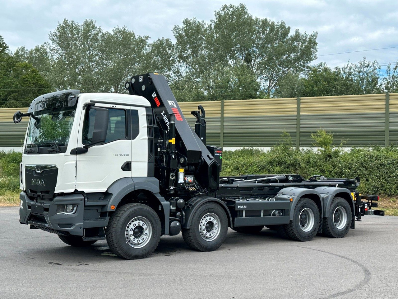 MAN TGS 35.520 8x4 Abrollkipper + Kran HIAB 658E6 - Camión multibasculante, Camión grúa: foto 3 MAN TGS 35.520 8x4 Abrollkipper + Kran HIAB 658E6 - Camión multibasculante, Camión grúa: foto 3